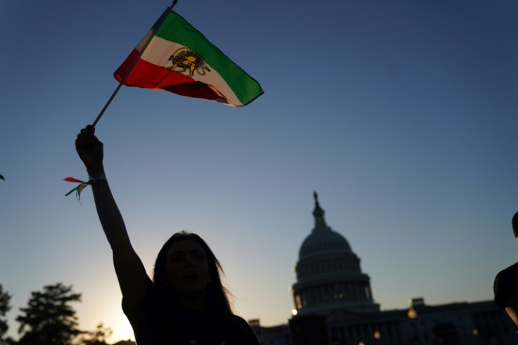 The fire, whose origin remains unclear, came as Iran marked one month of protests over the the death of Amimi