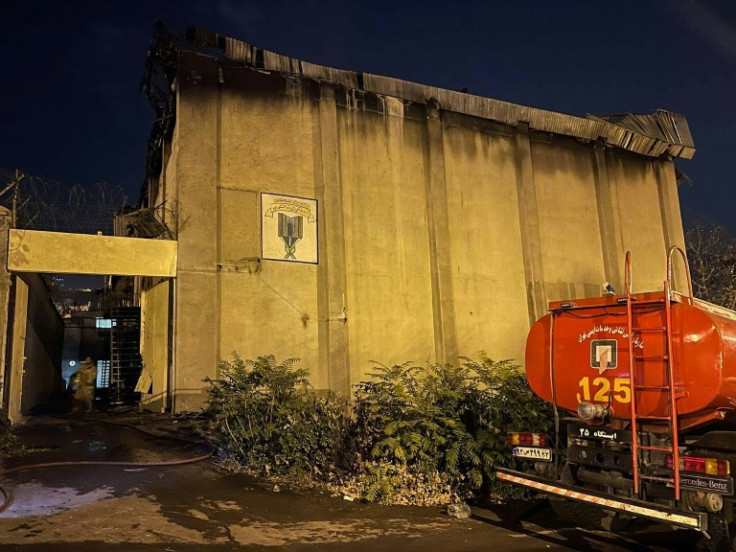 A fire truck is parked outside Tehran's Evin prison after the blaze overnight, in an image obtained from Iranian news agency IRNA on October 16, 2022
