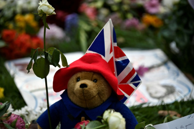 One of many Paddington Bear toys left by well-wishers in London for the queen