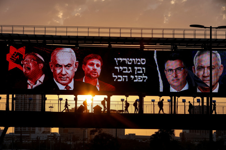 An election campaign billboard of the National Unity Party, is seen on a bridge in Ramat Gan