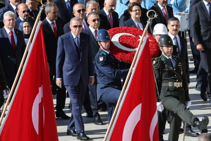 Turkish President Recep Tayyip Erdogan (C) is in a position of strength in talks with Sweden's bid for NATO membership