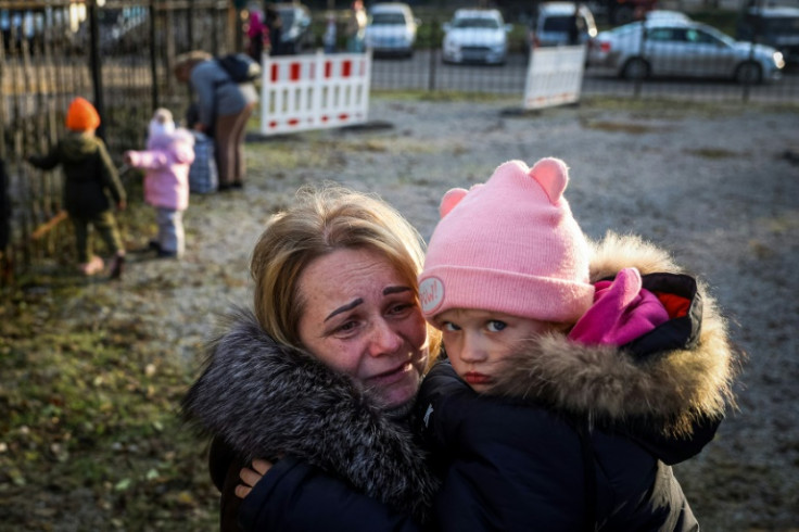 'We fled because eight guys with automatic rifles came to our house,' said Svetlana Titova, 52