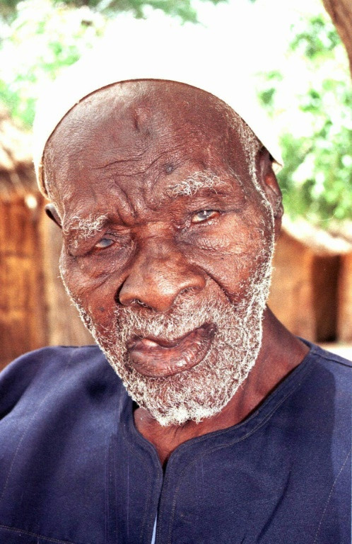 Abdoulaye Ndiaye, left, the last survivor of the African 'tirailleurs.' He was pictured by AFP in 1998 at the age of 104 -- he died on November 10 that year, a day before he was to receive the Legion of Honour
