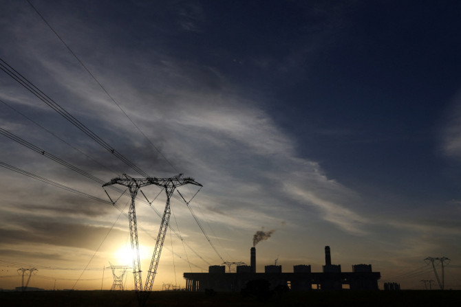 Electricity pylons are seen at the Kusile coal-fired power station in the Mpumalanga province