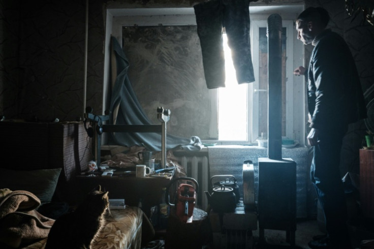 Those who have stayed, like Oleksandr Lugovskykh, rely on wood-burning stoves for heat