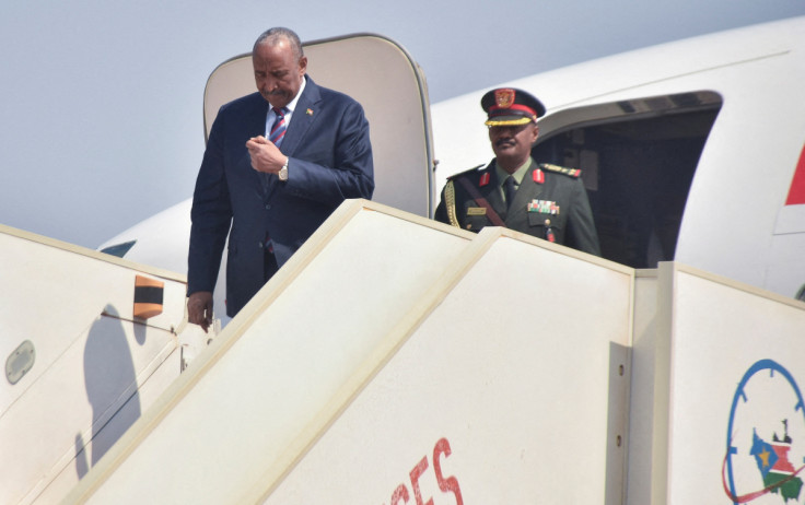 Sudan's Sovereign Council Chief General Abdel Fattah al-Burhan disembarks from a plane as he arrives at the Juba International Airport, in Juba