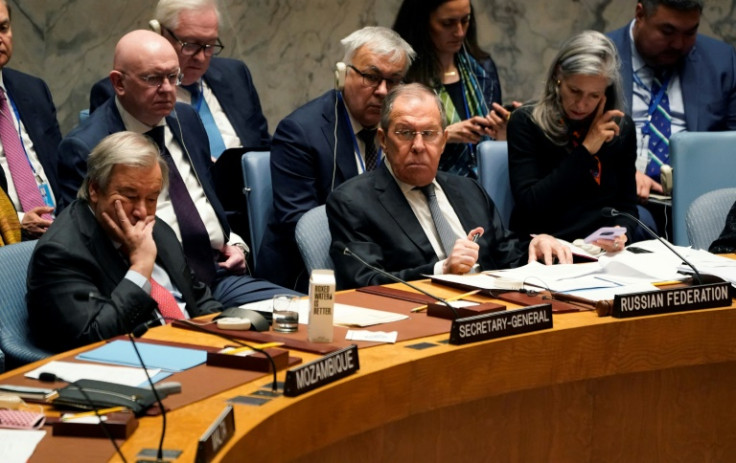 UN Secretary-General Antonio Gutterres (L) listens as Russian Foreign Minister Sergey Lavrov (C) chairs a UN Security Council meeting in New York on April 24, 2023