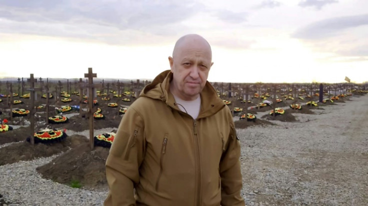 In one recent video, Prigozhin stood in front of the bodies of fallen soldiers berating the defence minister