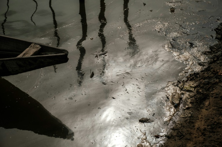 A sheen of oil on the River Bodo in the village of Ogoniland in the Niger Delta region. The picture was taken in 2019, 10 years after th oil spilled