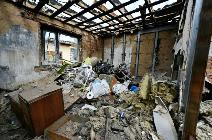 A destroyed house following a strike in the village of Tsirkuny, Kharkiv region