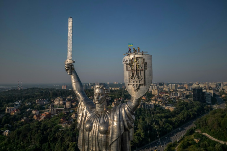 The operation to put the trident in place of the Soviet emblem on the 62-metre-tall steel figure of a woman, known as the Fatherland Mother, began last month
