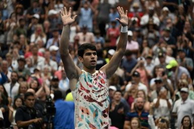 Spain's Carlos Alcaraz reacts after booking his place in the US Open quarter-finals with a straight sets win over Matteo Arnaldi