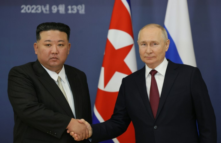 Putin (right) praised the "strengthening of cooperation and friendship between our countries", while hosting Kim (left) at a spaceport in Russia's far east