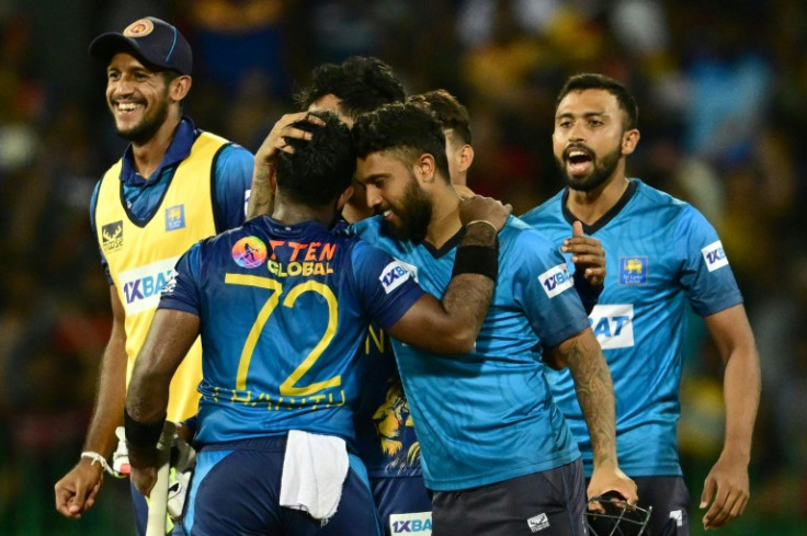 Sri Lanka's Charith Asalanka (2nd L) Kusal Mendis (2nd R) celebrate sri Lanka's two wicket win