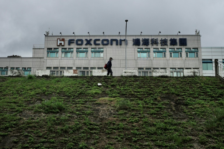 Taiwan defended tech giant Foxconn after China launched an investigation into several of the firm's sites
