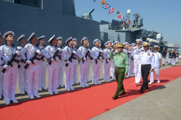 Myanmar's military chief Min Aung Hlaing (C) salutes Russian Navy personnel on November 6 ahead of joint maritime exercises at Thilawa Port in Yangon