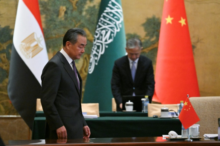 China's Foreign Minister Wang Yi attends a meeting with foreign ministers from Arab and Muslim-majority nations at the Diaoyutai State Guest House in Beijing on November 20, 2023. The international community must take urgent action to stop the "humanitari