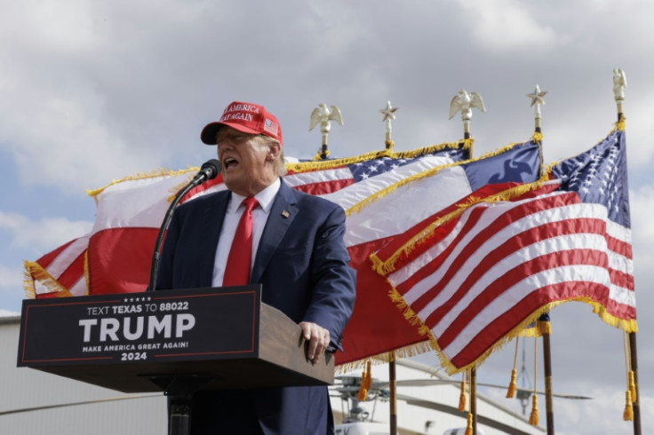 Former US president Donald Trump gives remarks at the South Texas International airport on November 19, 2023 in Edinburg, Texas