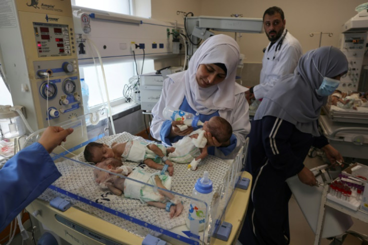 Palestinian medics care for premature babies evacuated from Al-Shifa hospital to the Emirates hospital in Rafah, the southern Gaza Strip