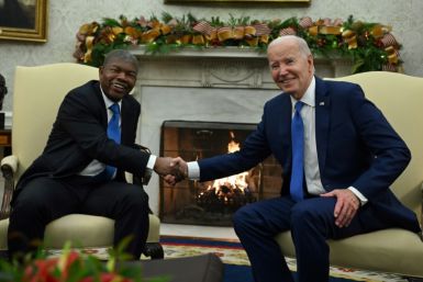 US President Joe Biden (R) shakes hands with Angolan President Joao Lourenco during a meeting in the White House, where Biden said the United States is 'all in on Africa'