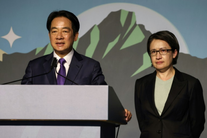 President-elect Lai Ching-te (L) and his running mate Hsiao Bi-khim attend a press conference in Taipei on the poll day