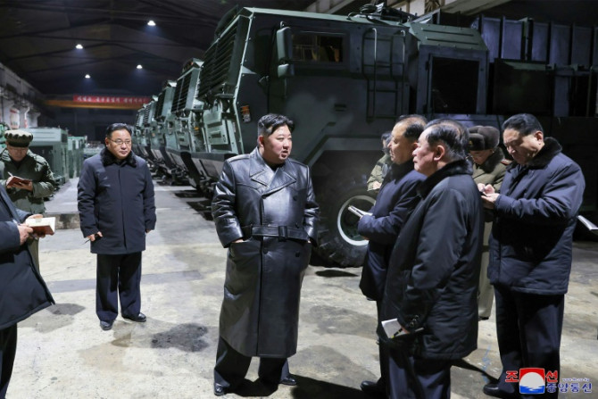 North Korean leader Kim Jong Un inspects a major munitions factory at an undisclosed location in a photo provided by state-run news agency KCNA