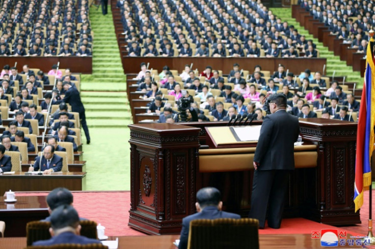 North Korea's rubber-stamp parliament voted to abolish the agencies overseeing cooperation and reunification with the South