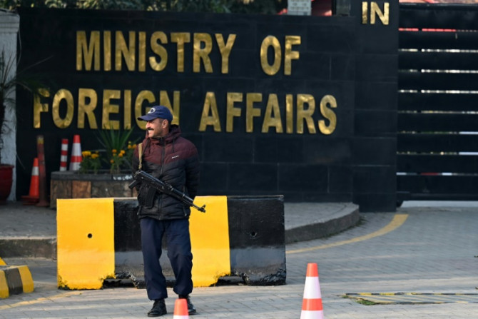 A police officer stands guard outside Pakistan's foreign ministry in Islamabad on January 18, 2024