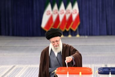Supreme leader Ayatollah Ali Khamenei casts his ballot, appealing for citizens to do the same because Iran's 'enemies want to see if the people are present'