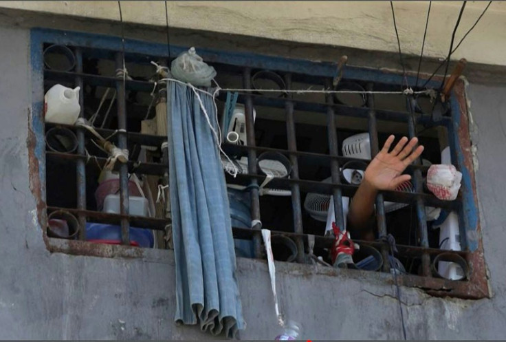 Few people remained in the biggest prison in Haiti's captial after attack by gang members allowed thousands to escape