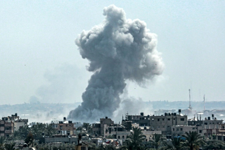 Smoke rises over central Gaza after Israeli shelling on the 200th day of the war