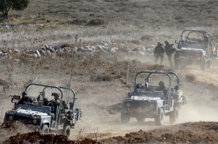 Israeli troops deploy inside the UN-patrolled buffer zone that is supposed to separate Israeli and Syrian forces on the Golan Heights.