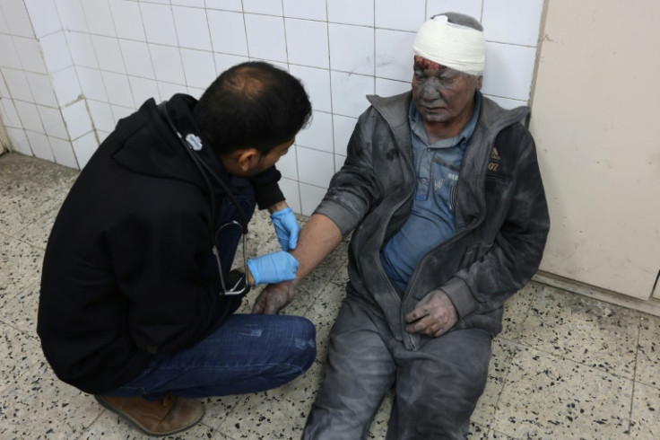 A wounded Palestinian man receives treatment at Al-Ahli Arab hospital in Gaza City, where the Civil Defence agency said an Israeli air strike killed four people